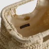 Paula echevarría woven crossbody bag