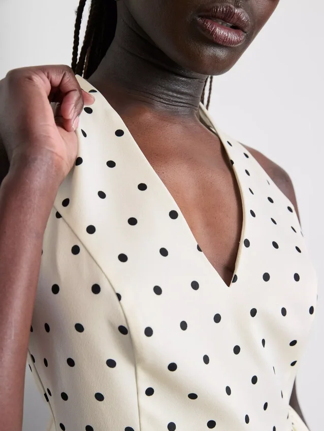 Polka dot halter neck peplum top