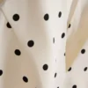 Polka dot halter neck peplum top