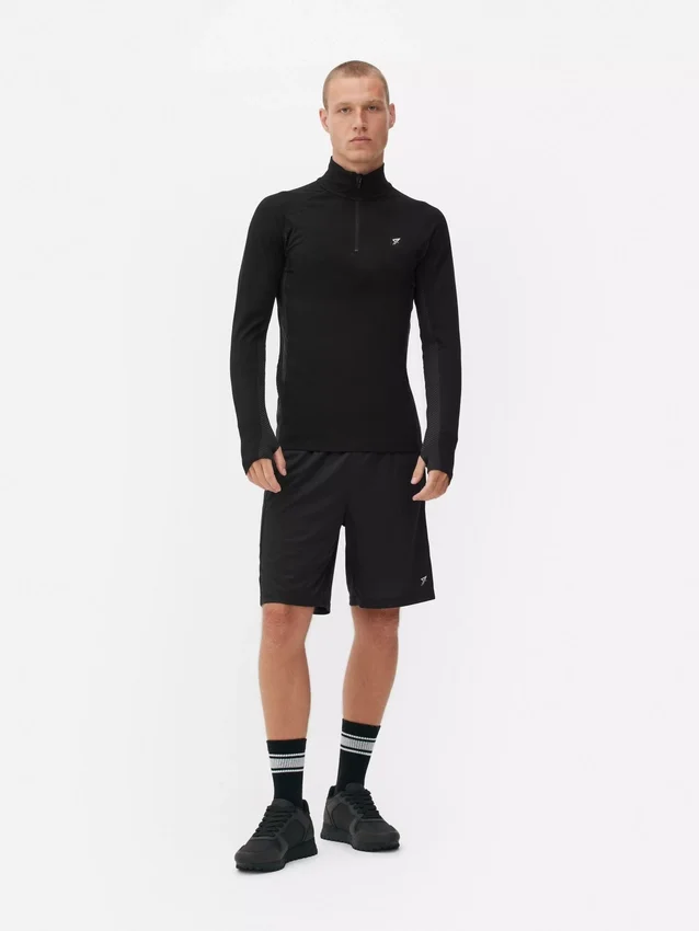 Quarter-zip long sleeve gym top