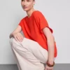 Relaxed round neck air flow tee