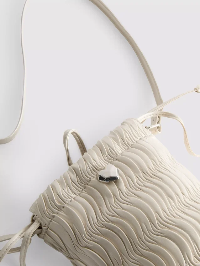 Ruched bucket crossbody bag