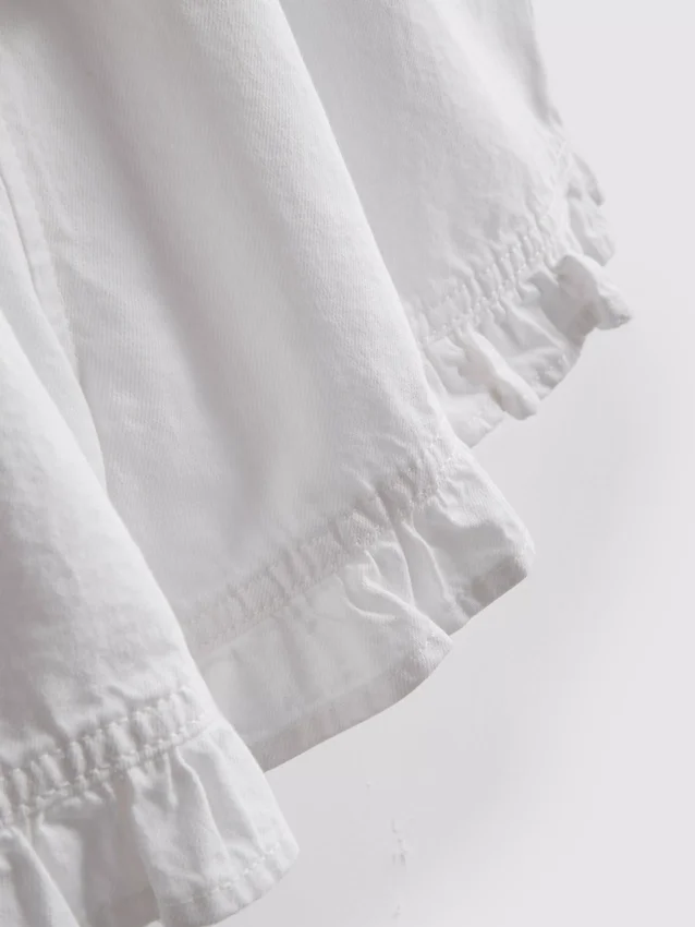 Ruffle hem denim shorts