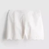 Scalloped embroidered cotton shorts