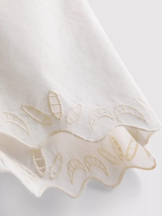 Scalloped embroidered cotton shorts