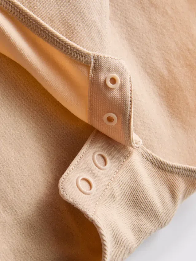 Seamless shaping bodysuit