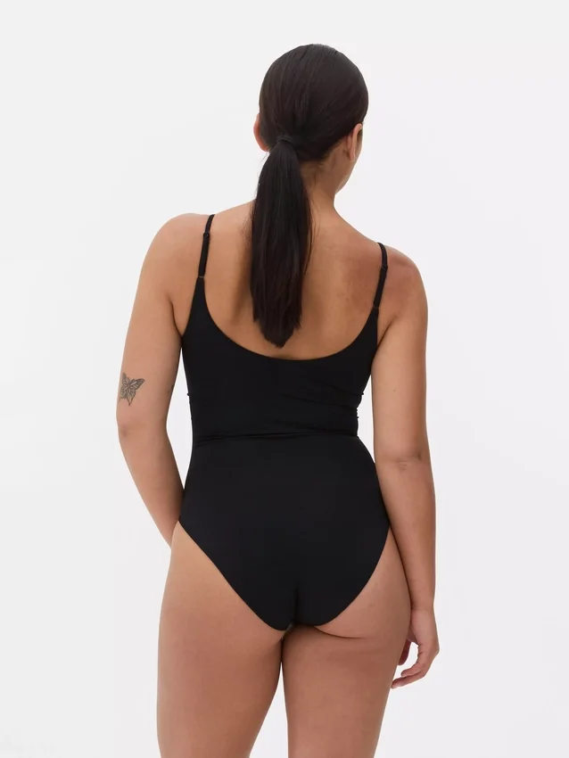 Seamless shaping bodysuit
