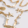 Shell charm chain belt