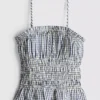 Shirred gingham peplum cami top