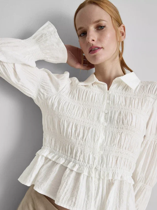 Shirred peplum hem blouse