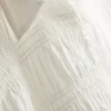 Shirred peplum hem blouse