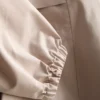 Short cinched rain jacket