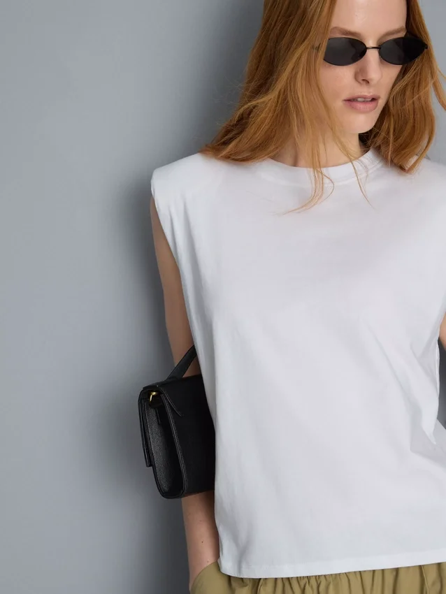 Sleeveless padded-shoulder tee