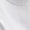 Sleeveless padded-shoulder tee