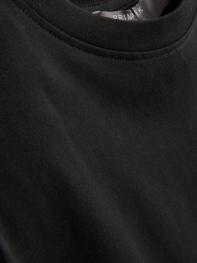 Sleeveless padded-shoulder tee