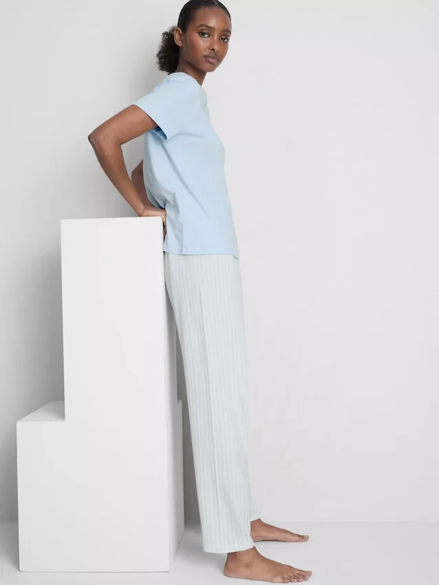 T-shirt and striped-bottom pajamas