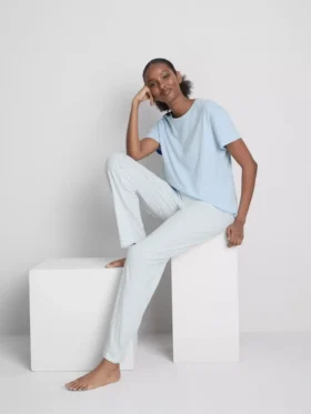 T-shirt and striped-bottom pajamas