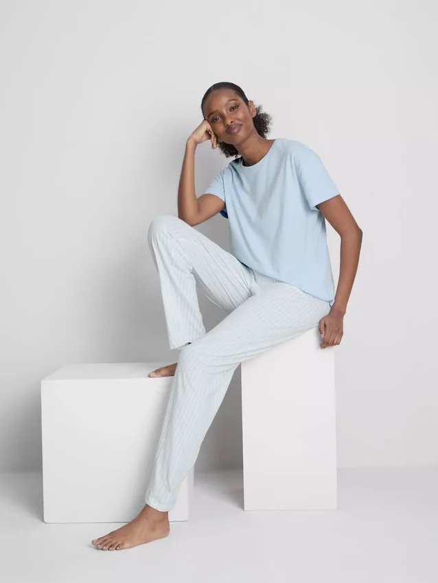 T-shirt and striped-bottom pajamas