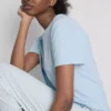 T-shirt and striped-bottom pajamas