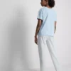 T-shirt and striped-bottom pajamas