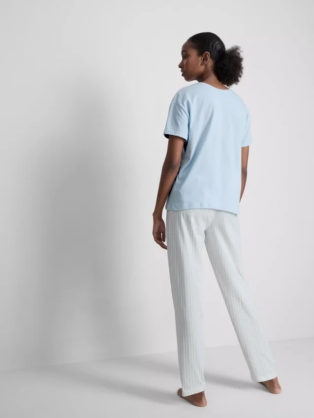 T-shirt and striped-bottom pajamas