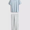 T-shirt and striped-bottom pajamas