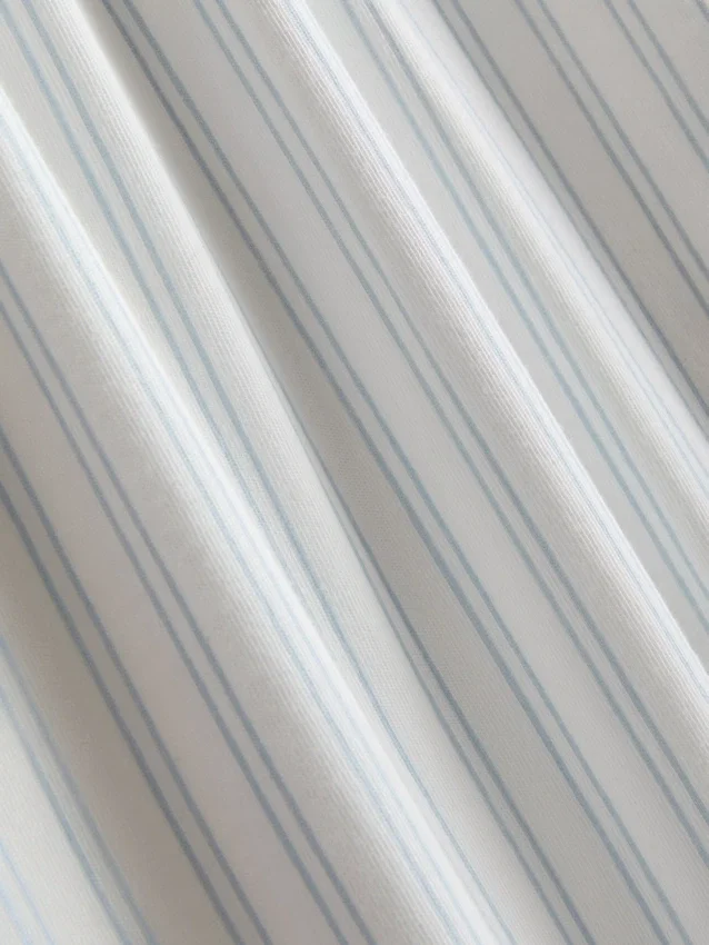 T-shirt and striped-bottom pajamas