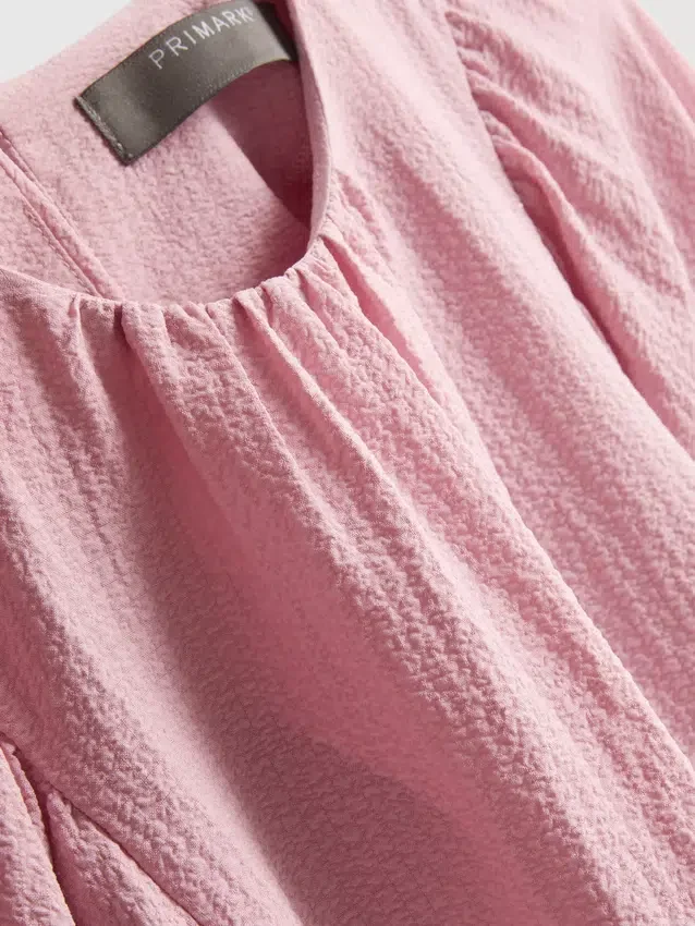 Textured balloon-sleeve blouse
