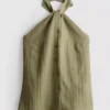 Textured button through halterneck top