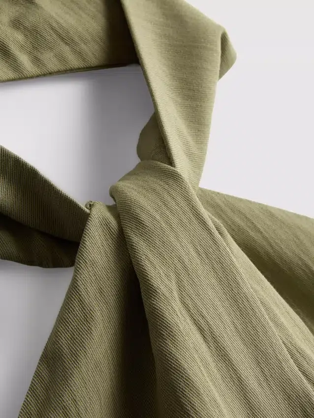 Textured button through halterneck top