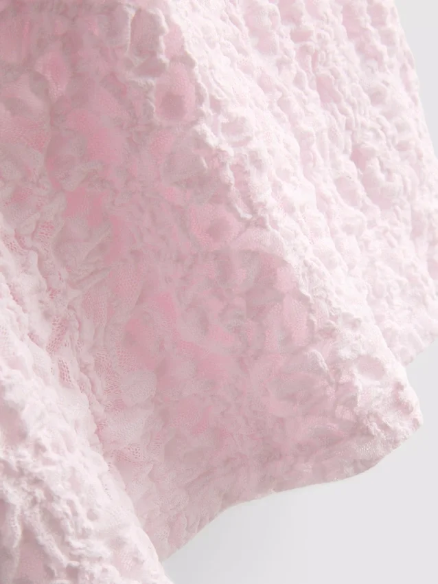 Textured high collar top