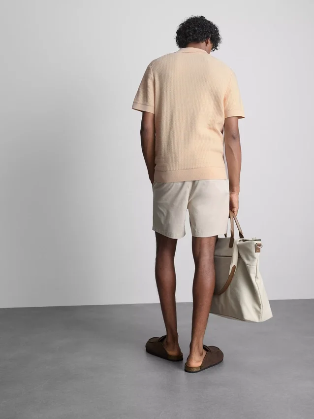 Textured knitted polo shirt