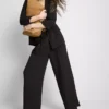 Textured slouchy mid-rise pants