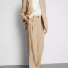 Textured slouchy mid-rise pants