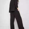 Textured slouchy mid-rise pants