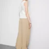Textured slouchy mid-rise pants