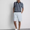 Textured stripe knit polo shirt