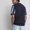 Textured stripe knit polo shirt