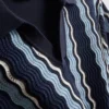 Textured stripe knit polo shirt