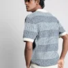 Textured stripe knitted polo shirt
