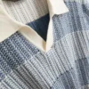 Textured stripe knitted polo shirt