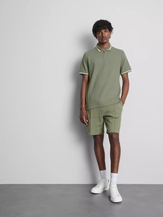 Textured zip-neck polo shirt