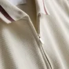 Textured zip-neck polo shirt