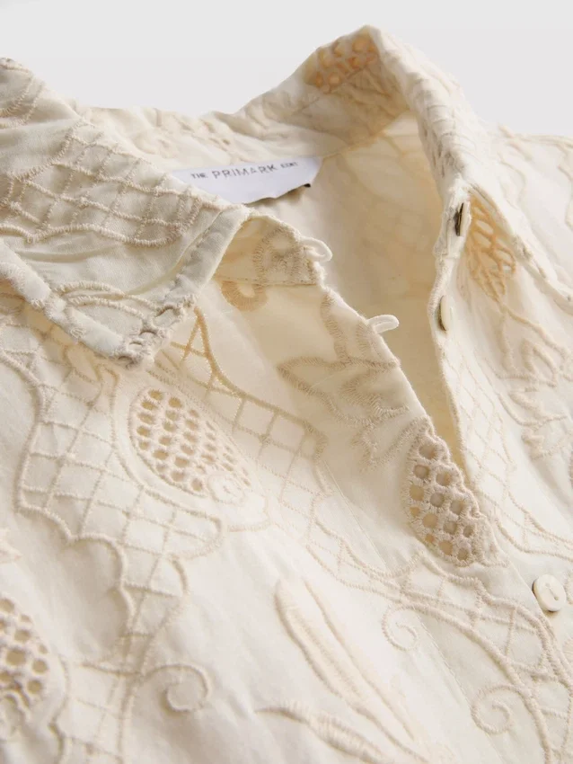 The edit curved-hem broderie shirt