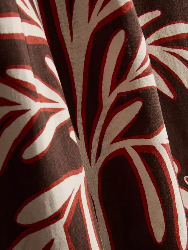 The edit linen-blend printed halter midi dress