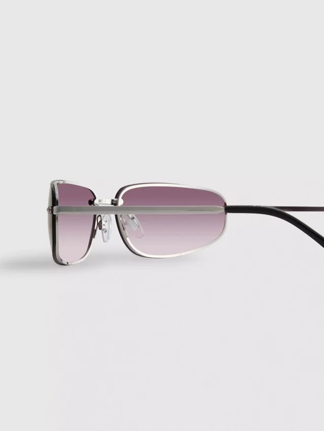 Tinted wrap-around sunglasses