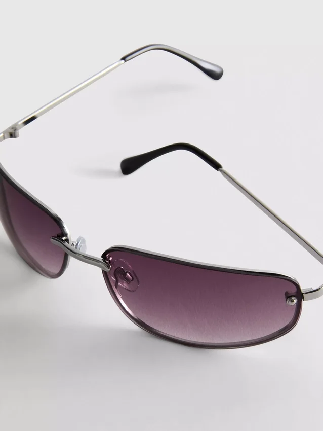Tinted wrap-around sunglasses