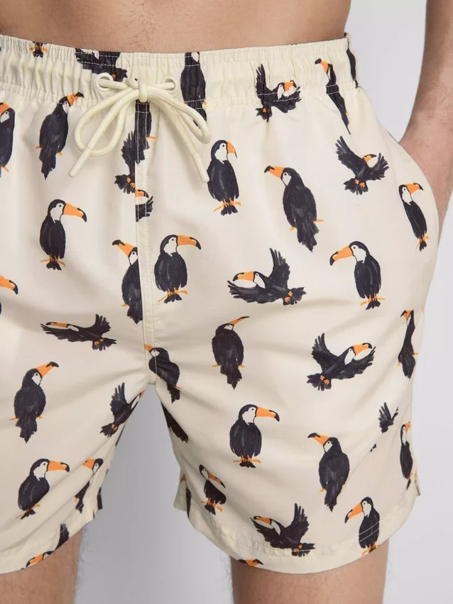 Toucan swim shorts with drawstring waistband