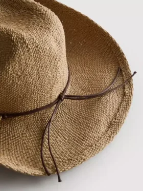 Trimmed straw cowboy hat