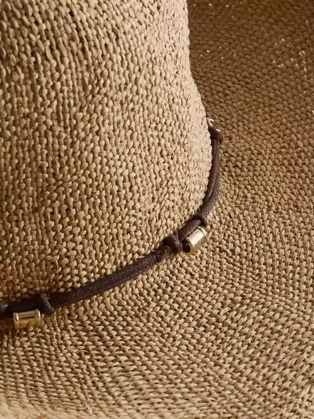 Trimmed straw cowboy hat